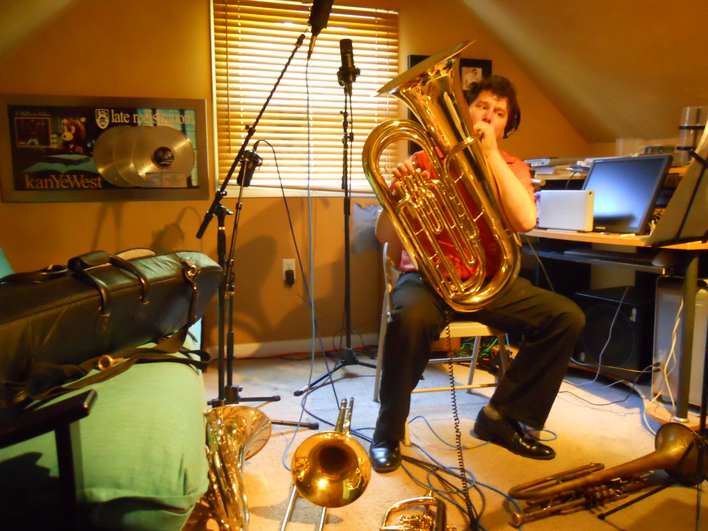 Danny Flam recording brass at Ken Lewis's studio, Kanye Late Registration plaque on the wall